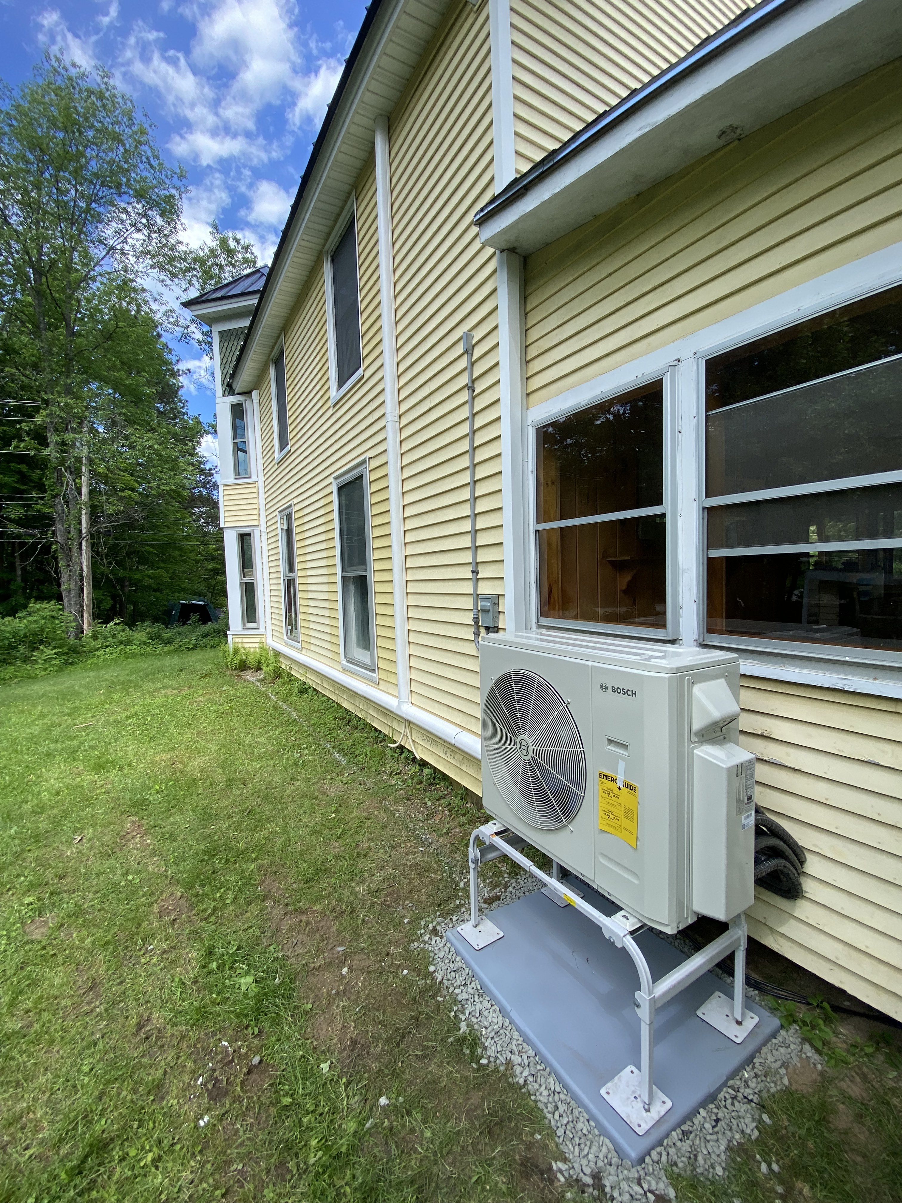 Bosch Inverter Beside a Farmhouse